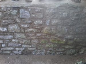 Repaired / re-jointed wall