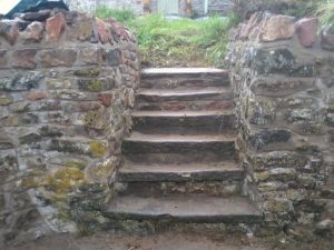 rebuilt/repointed with 'cock & hen' capping stones