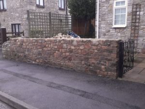 replaced with new double-faced wall