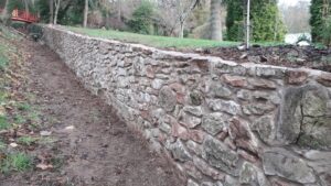 rebuilt using existing stone