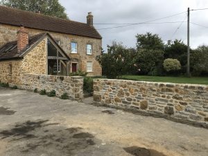 rebuilt with lime mortar pointing - awaits capping